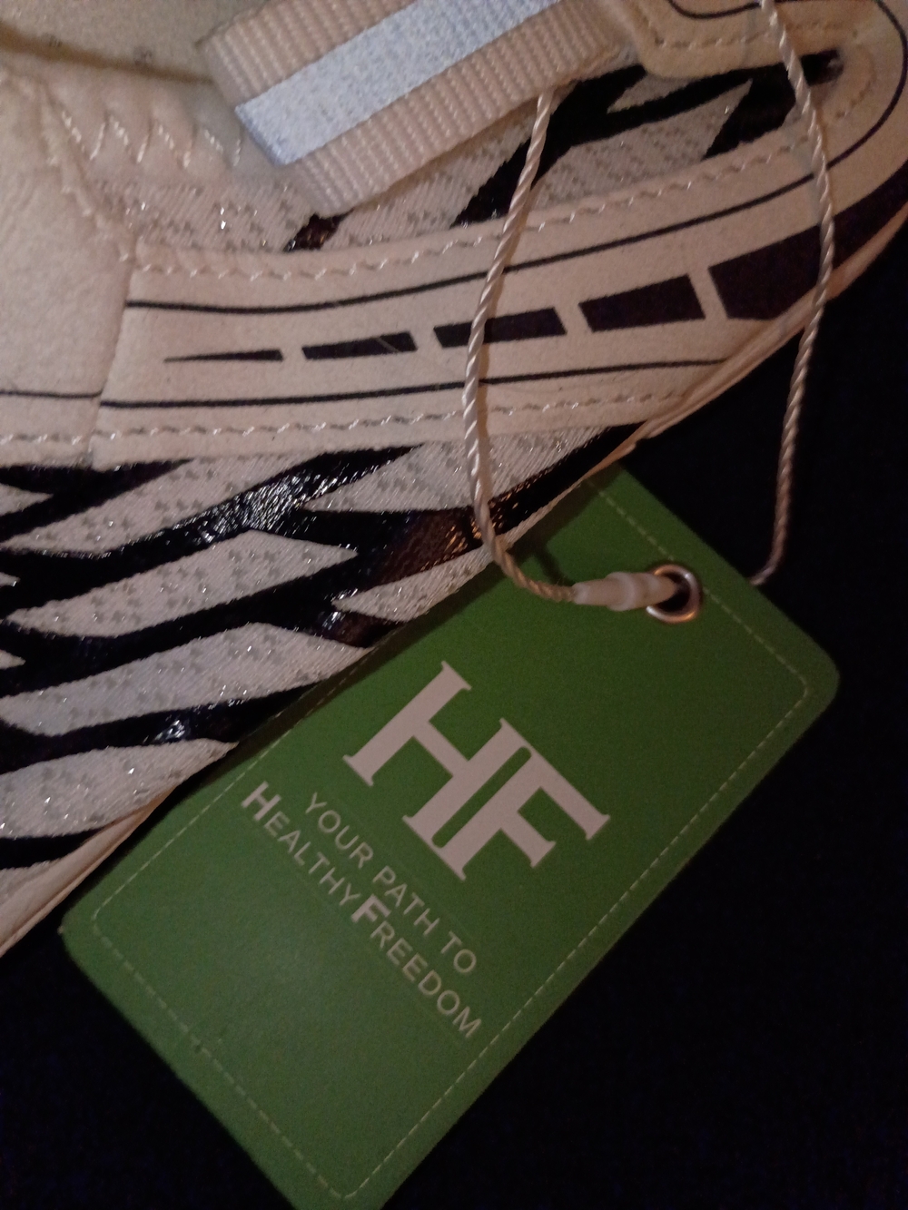 Women’s Cream Zebra-Print Sneaker with Black Accents